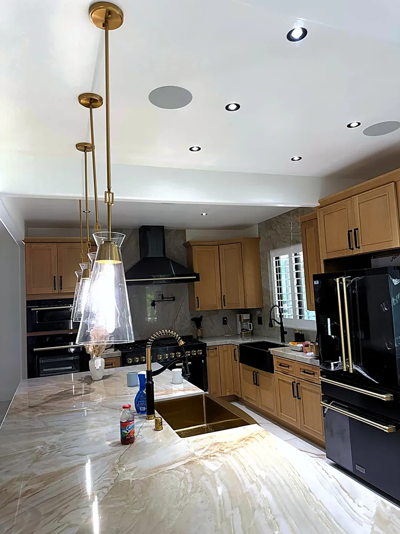 Island pendants and recessed lighting, installed by ElitePhase Electric